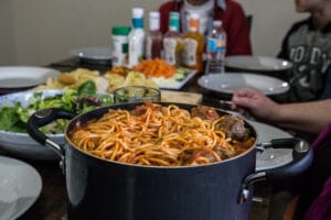 Brett and Ryan's table set with spaghetti dinner