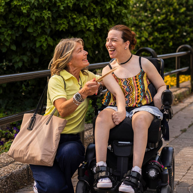 Girl Smiling In Whenchair